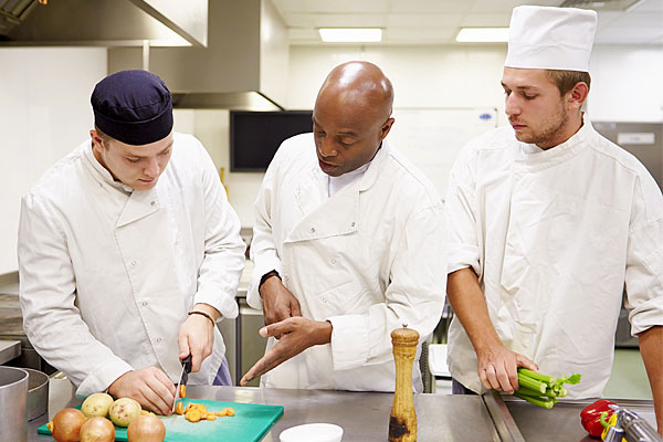 Staff being trained by chef