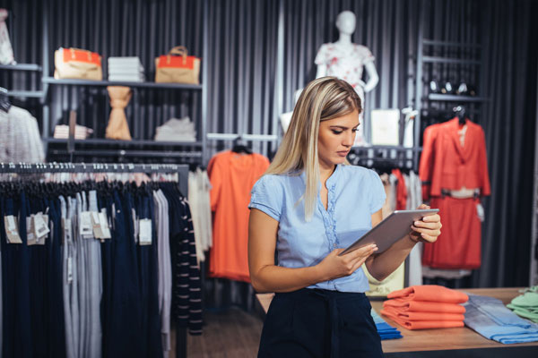 Member of staff in clothing shop